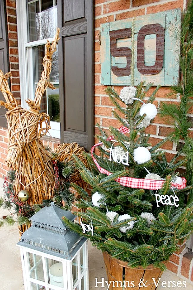 Grapevine reindeer with small Christmas tree on Porch - Hymns and Verses Blog