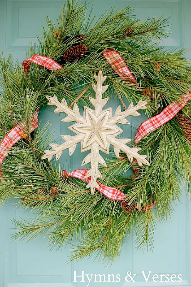 Winter Pine Wreath with Red and White Ribbon and Wooden Snowflake - Hymns and Verses Blog