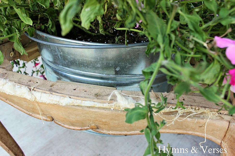 galvanized tub planter in chair seat