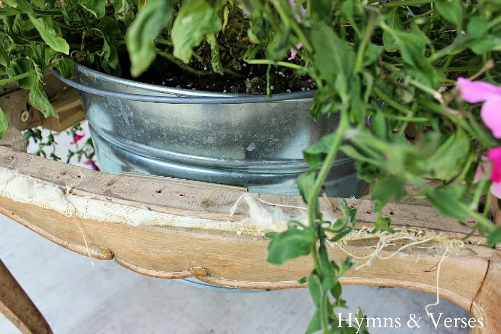 galvanized tub planter in chair seat