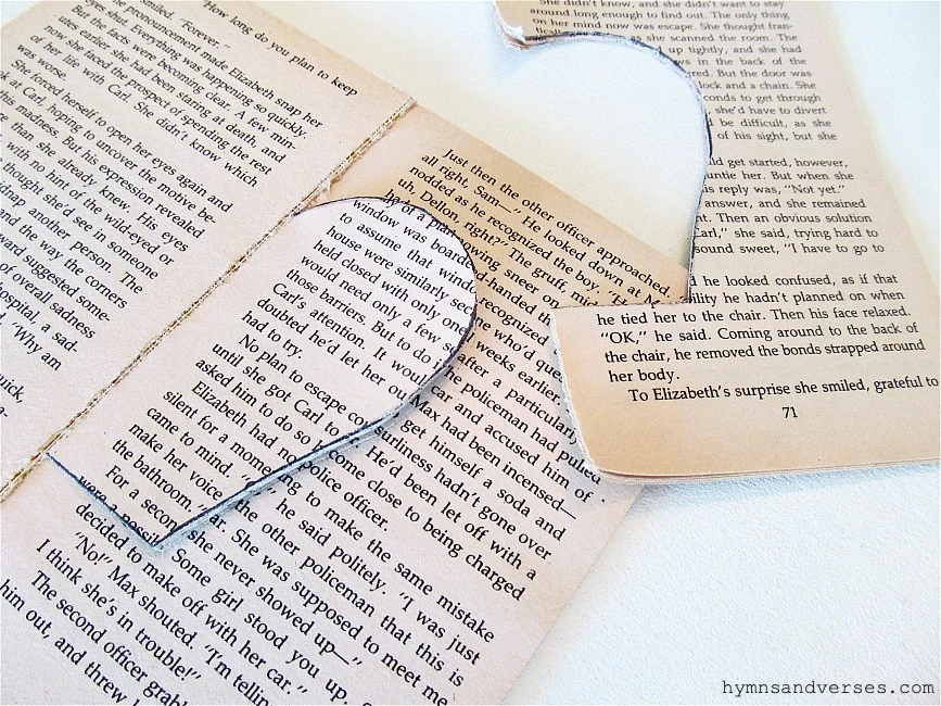 Cut apple shapes from paperback book