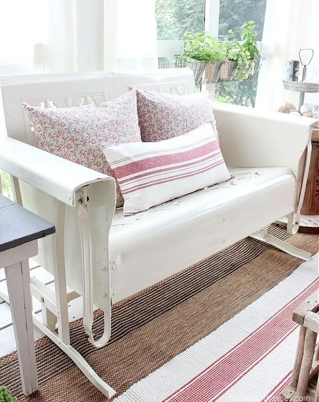 Vintage Metal Glider on Screened Porch