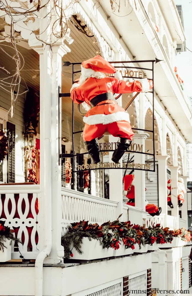 Santa perched on the sign at the Virginia Hotel in Cape May, NJ, at Christmas.