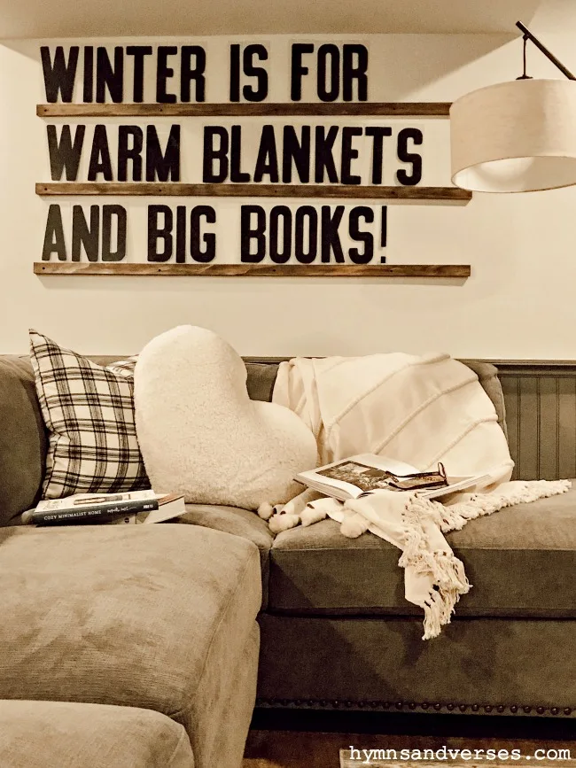 Giant Letter Board saying "winter is for warm blankets and big books"