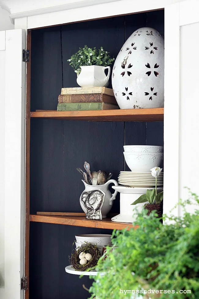 Interior of Corner Cabinet with Spring Decor