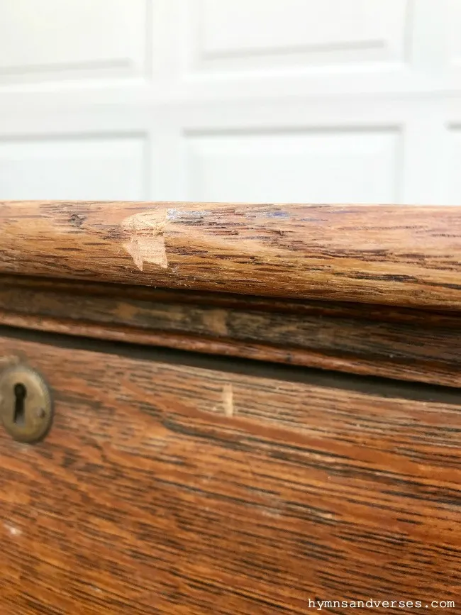 Old Dresser with Chipping Wood on Edge for Repair