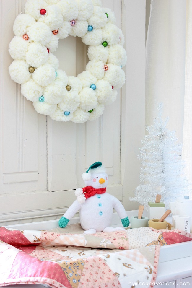 Styled for Christmas Baby Dresser with Pom Pom Wreath and Snowman