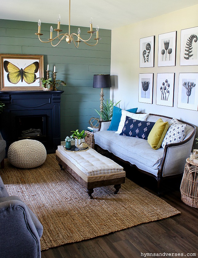 Modern farmhouse living room with moody green shiplap accent wall - Hymns and Verses Blog