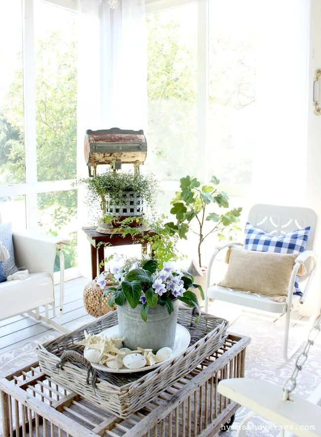 Summer screened porch with vintage scale, vintage metal furniture and chicken crate coffee table - Hymns and Verses Blog