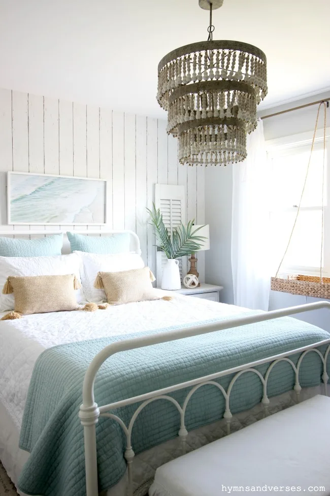 Summer coastal cottage style bedroom with planked wall - Hymns and Verses Blog
