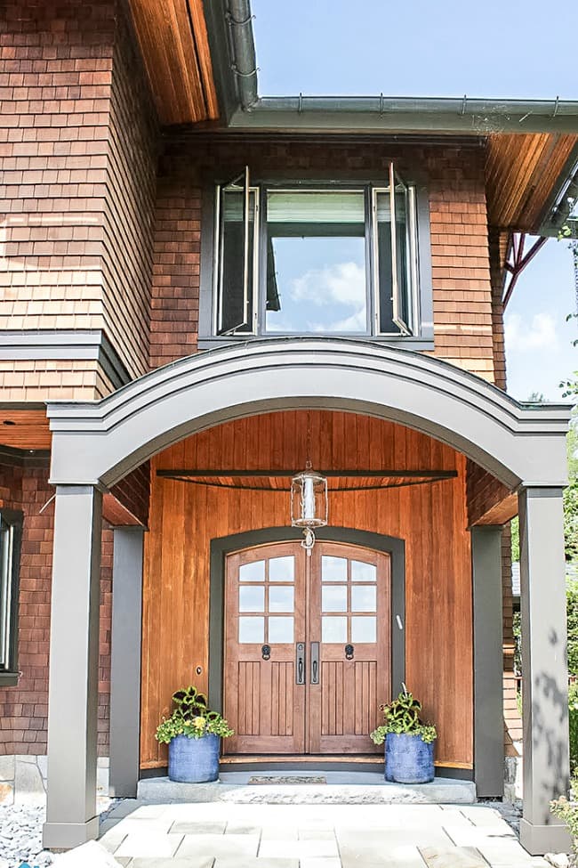 Colorado inspired home - front door with blue planters