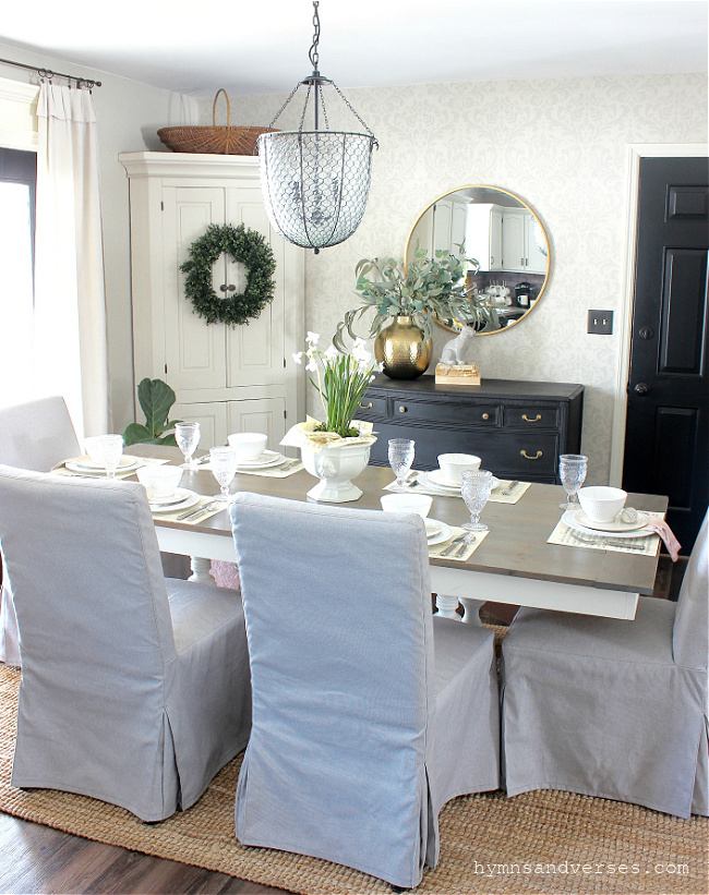 Black, white and gray spring dining room with green accents
