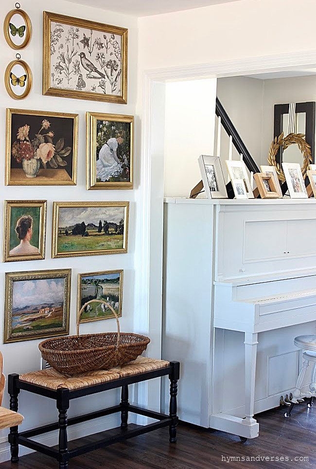 Narrow Gallery Wall with Vintage Art in Upcycled Thrift Store Frames