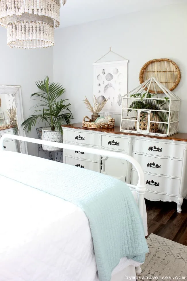 Coastal Cottage Style Bedroom with vintage french country dresser.