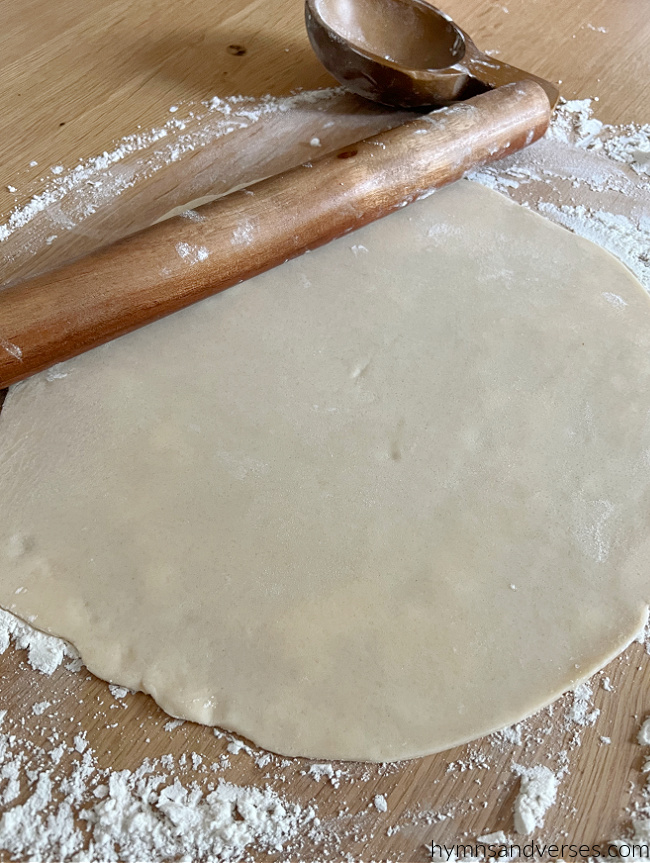 Roll out pie dough on floured surface