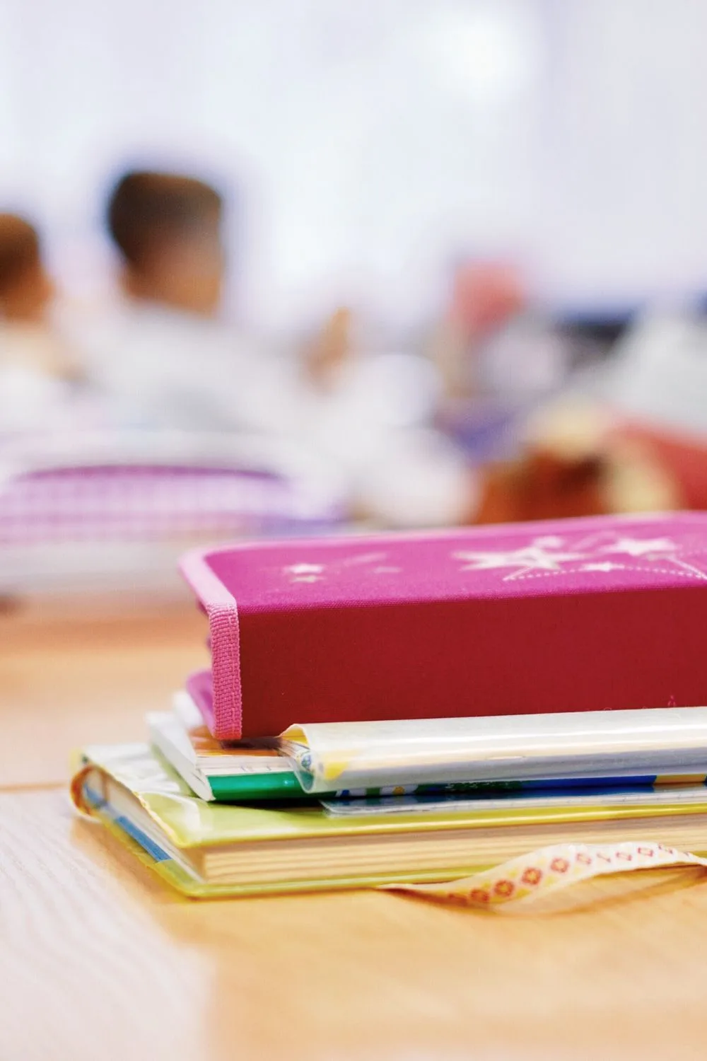 school books on desk before class